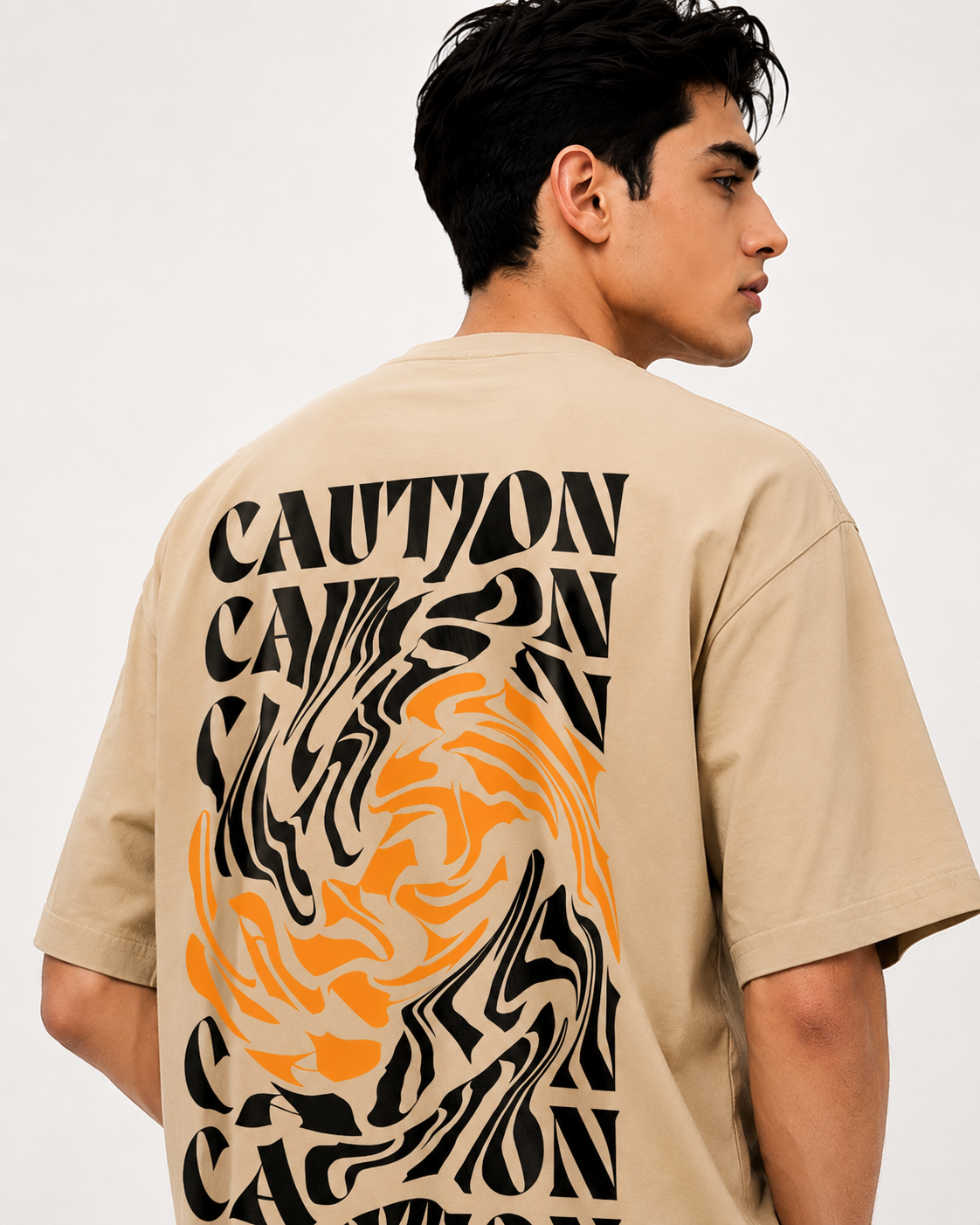 Styled back view of men’s beige t-shirt