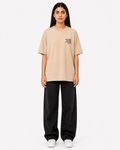 Front view of women’s beige cotton t-shirt